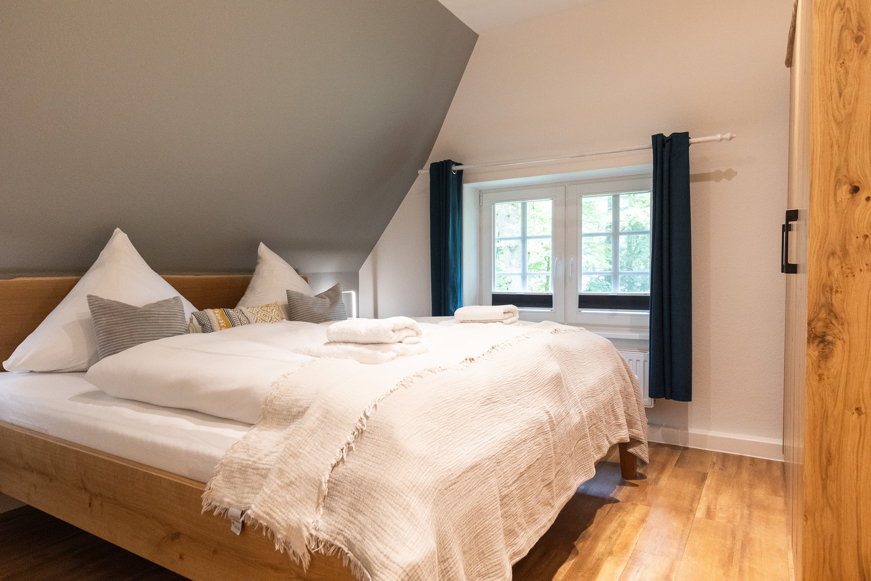 Schlafzimmer in der Ferienwohnung Turmberg auf dem Hof Bockelmann in Bispingen Lüneburger Heide