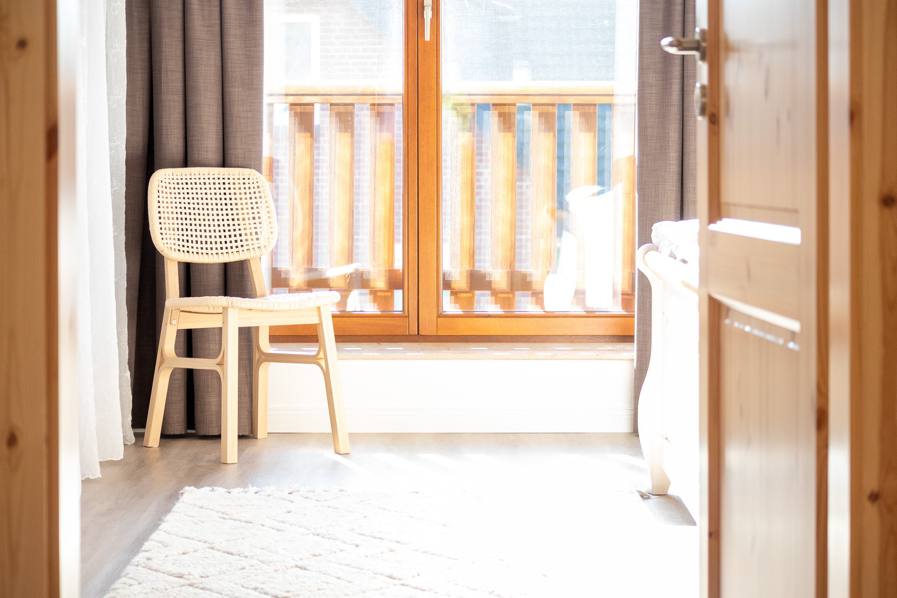 Ferienhaus LandMeer in Garlstorf Schlafzimmer mit Sitzgelegenheit