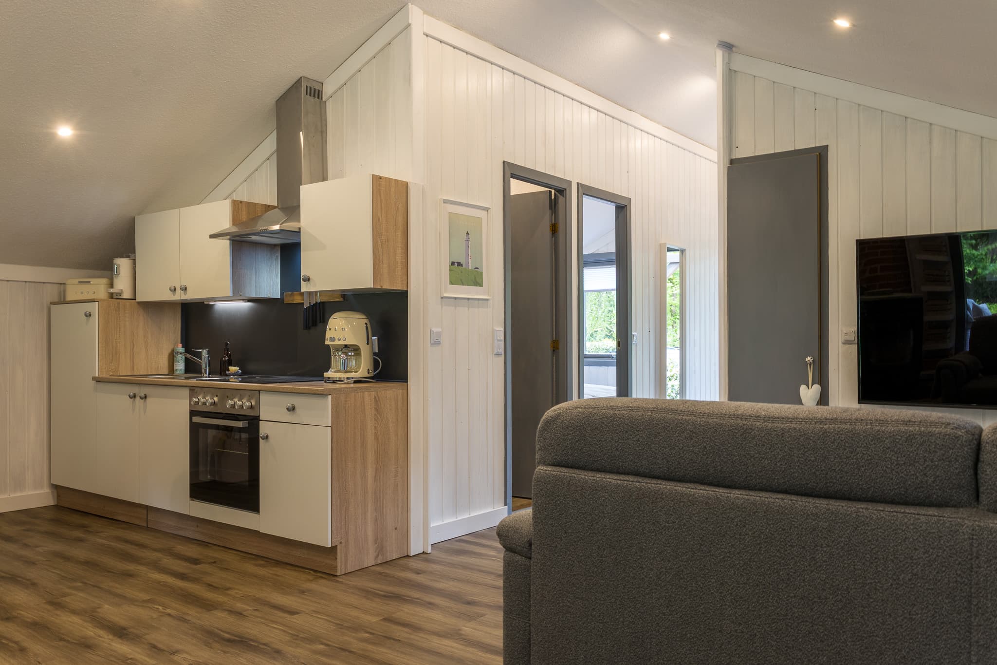 Ferienhaus Trä Hus Küche und Wohnzimmer