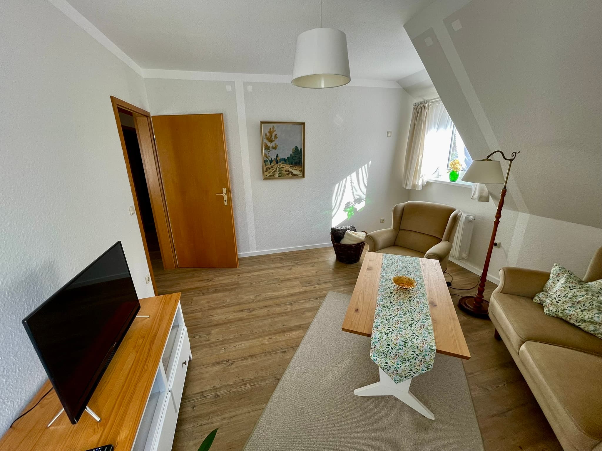 Haus Helga Wohnzimmer im Retrolook mit TV in Hermannsburg