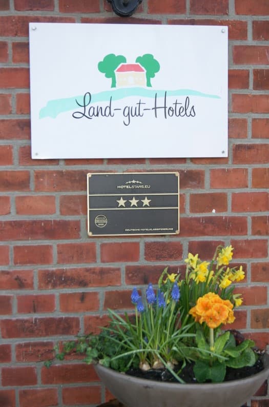 Logo und Auszeichnung des Hotel Allerhofs in Frankenfeld