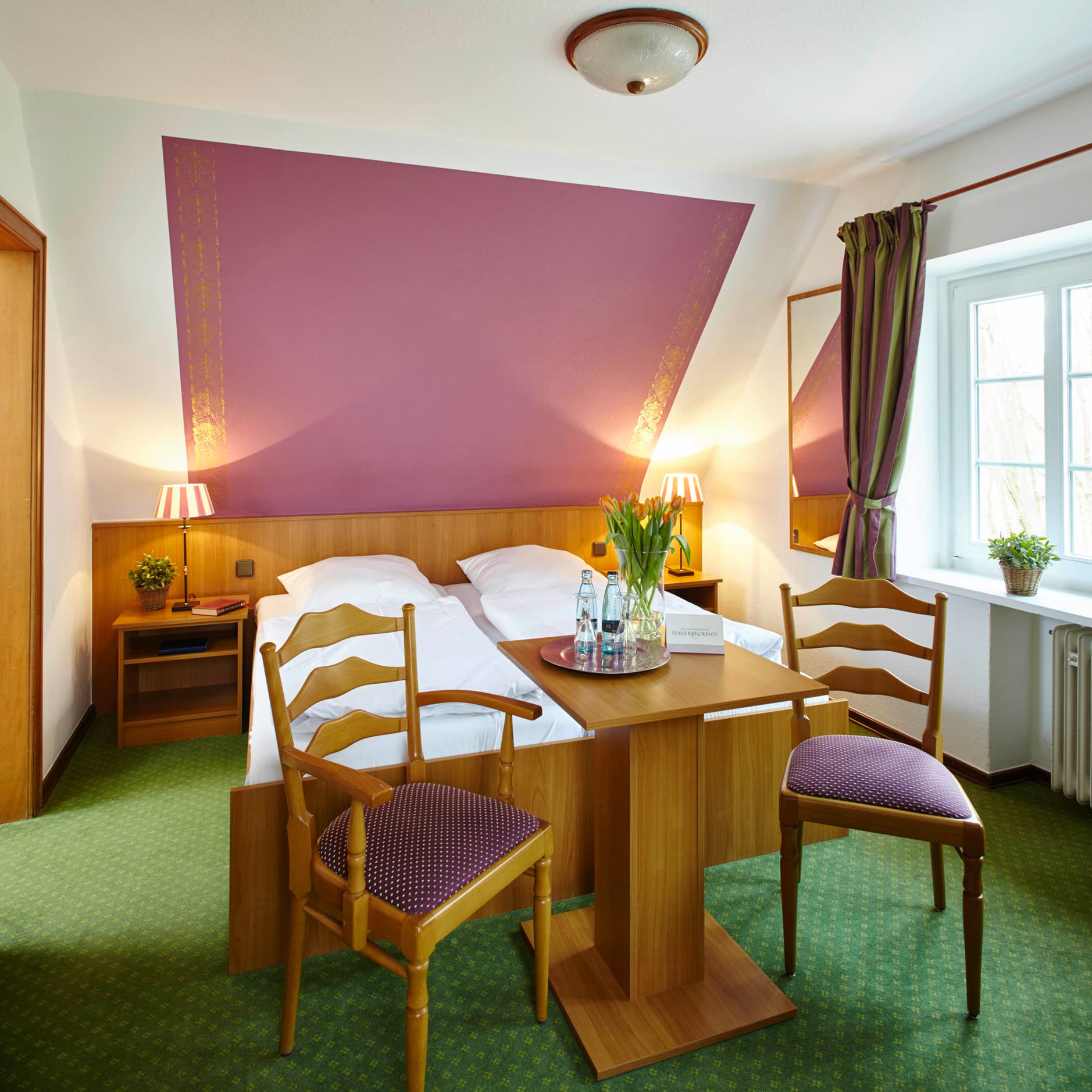Doppelzimmer Lila in dem Naturotel Landhaus Haverbeckhof in Bispingen