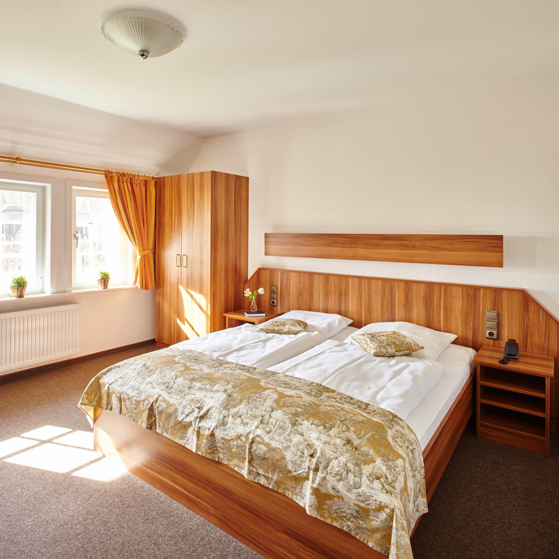 Doppelzimmer Weiß in dem Naturotel Landhaus Haverbeckhof in Bispingen