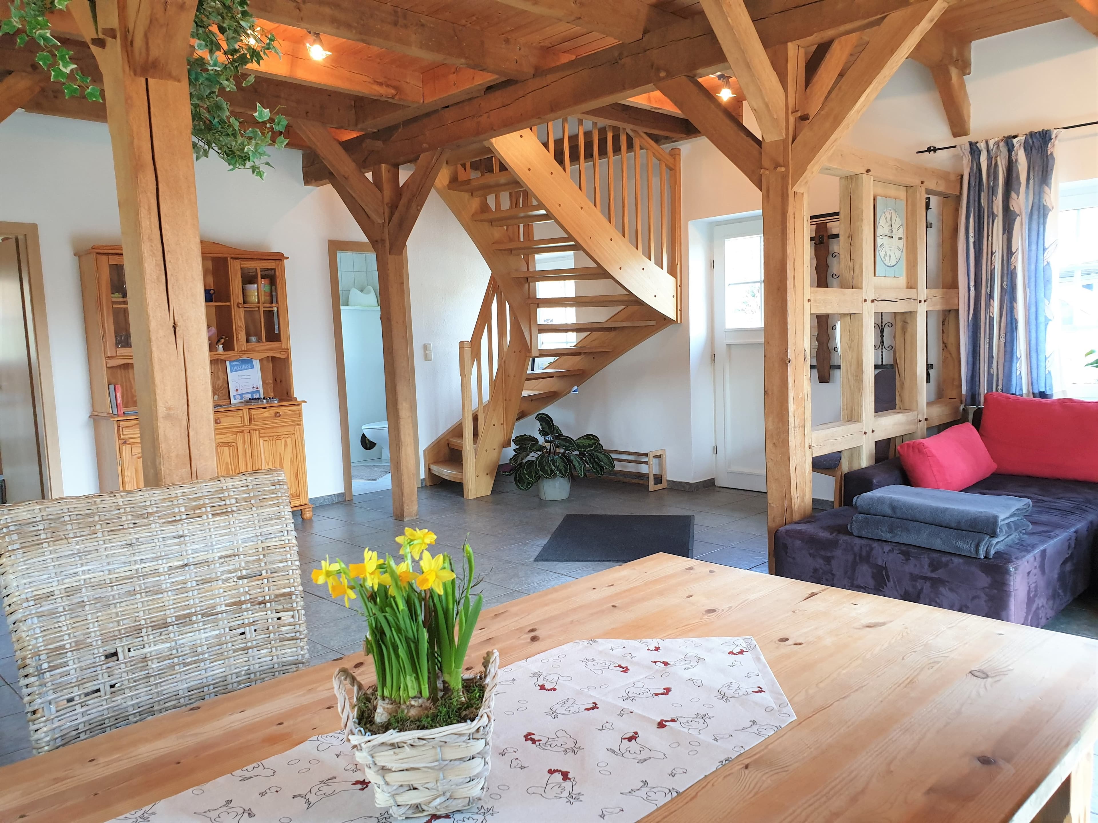 Wohnzimmer des Niedersachsenhauses des Reiter- und Ferienhof Cohrs in BispingenLiving room of the Niedersachsenhaus of the Cohrs riding and vacation farm in BispingenStuen i Niedersachsenhaus på Cohrs' ride- og feriegård i BispingenWoonkamer van het Niedersachsenhaus op de manege en vakantieboerderij Cohrs in Bispingen