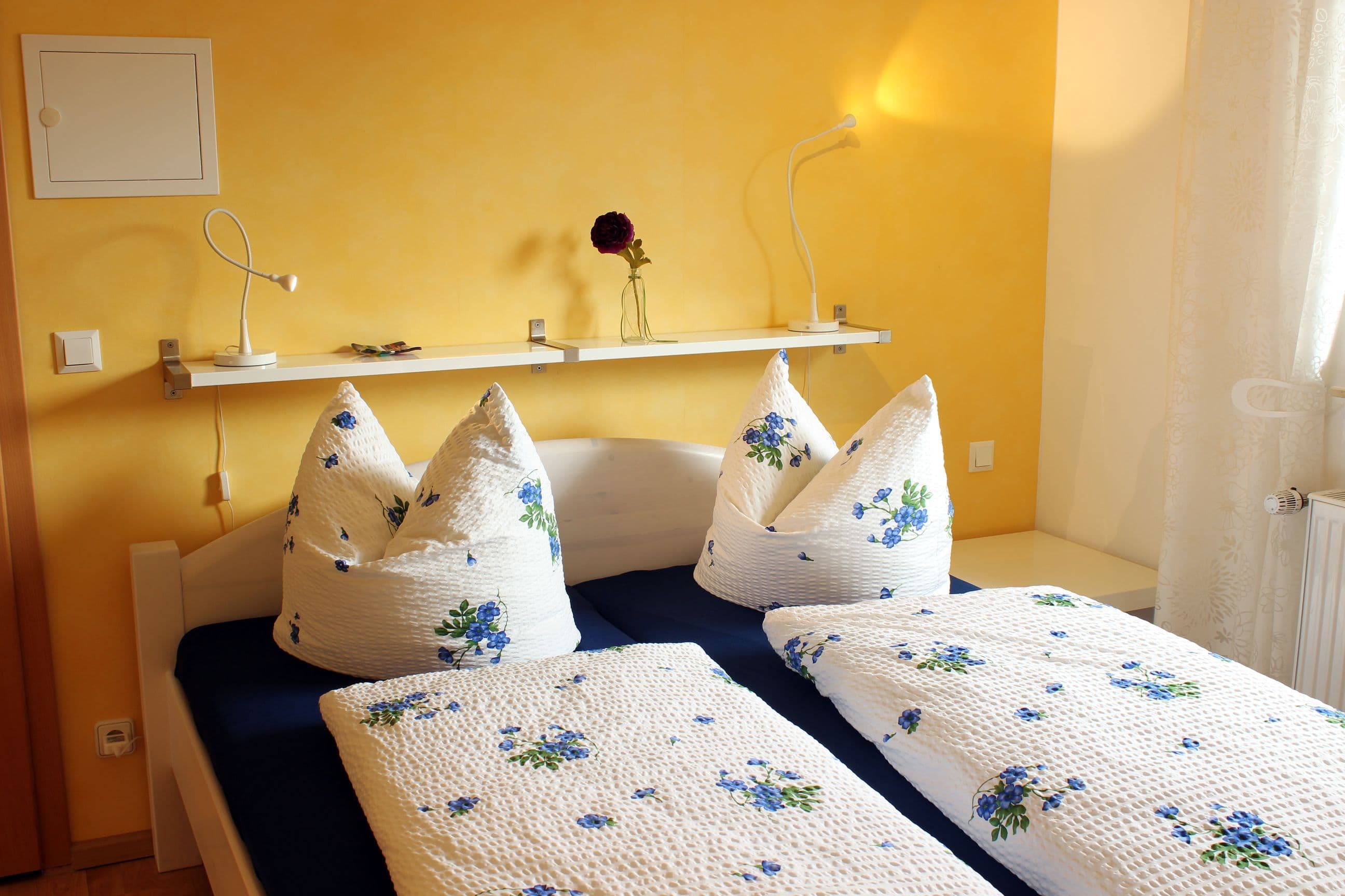 Ferienwohnungen HAUS 52 grad NORD schlafzimmer 1