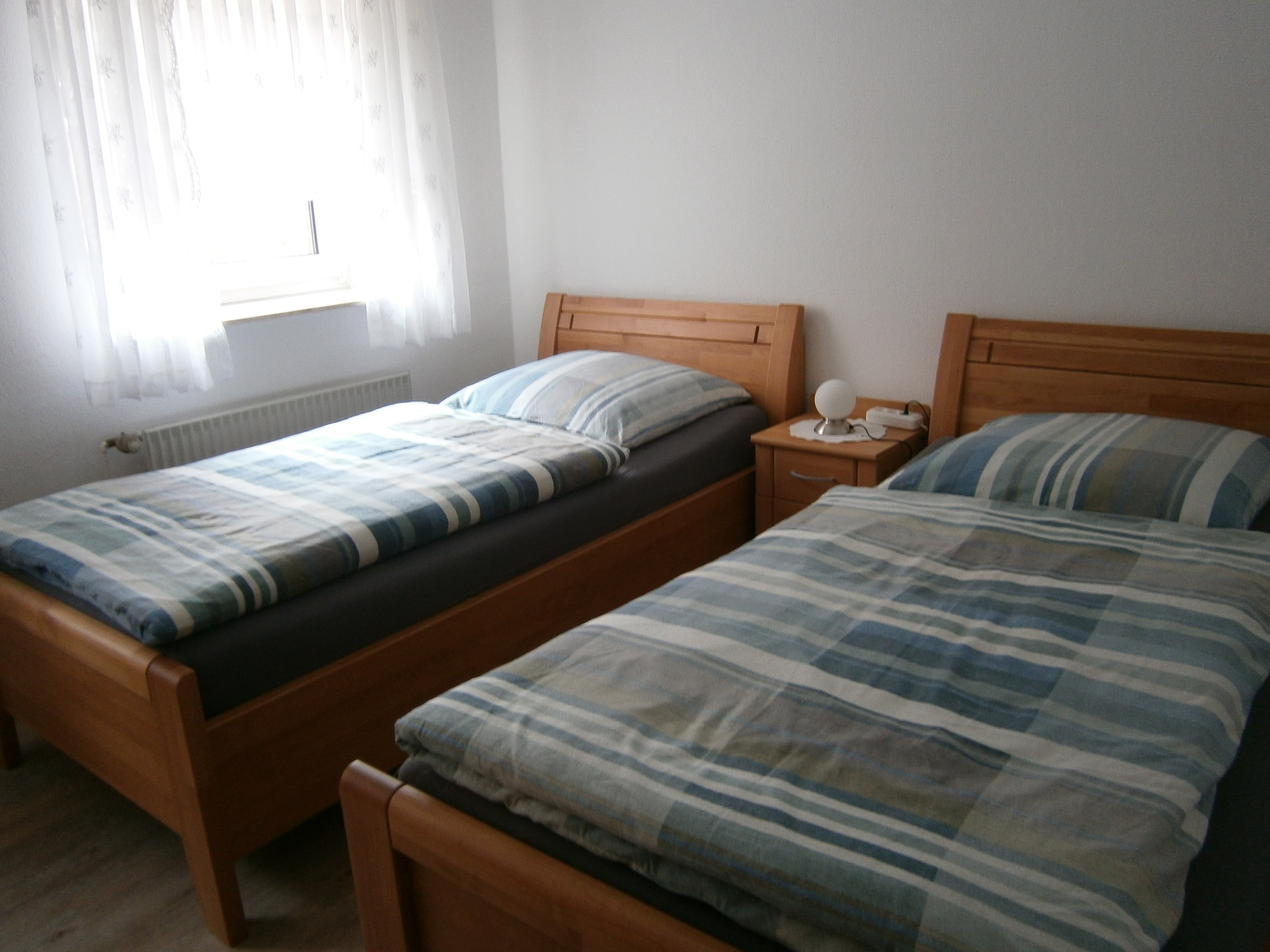 Schlafzimmer in den Ferienwohnungen Thiele in Hollenstedt