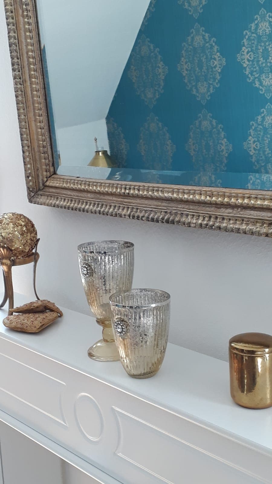 Ferienwohnung Weiße Wolke Kaminumrandung im Wohnzimmer