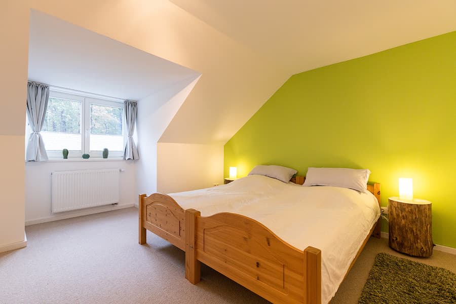 Schlafzimmer in den Ferienwohnungen Villa-Duck-Dich-Südheide in Hermannsburg