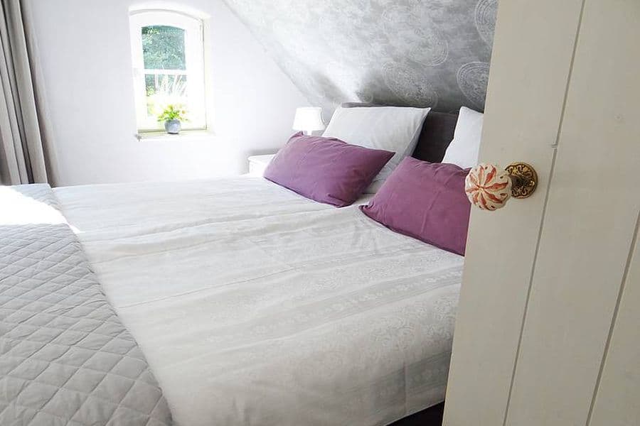 Doppelbett in der Ferienwohnung "Die kleine Schwester" in Müden (Örtze)