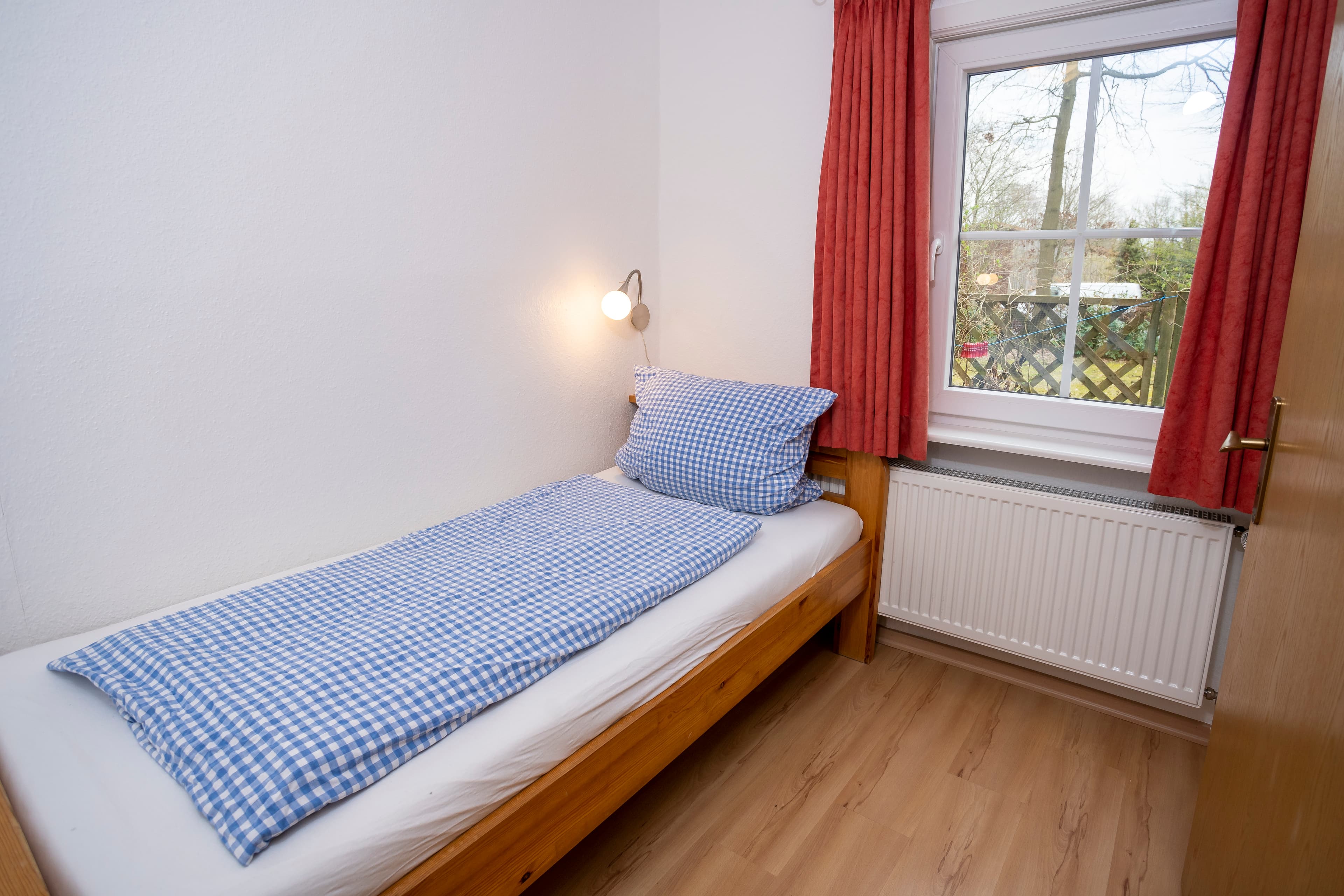 Schlafzimmer 2 in dem Ferienhaus des Rhododendronhof Bockelmann in Bispingen